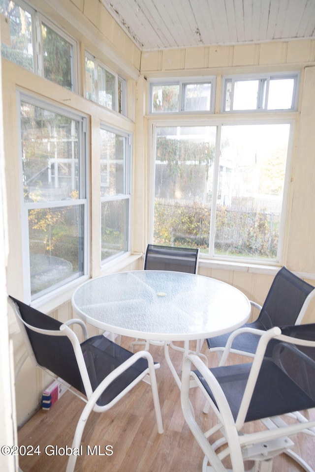 sunroom / solarium with wooden ceiling