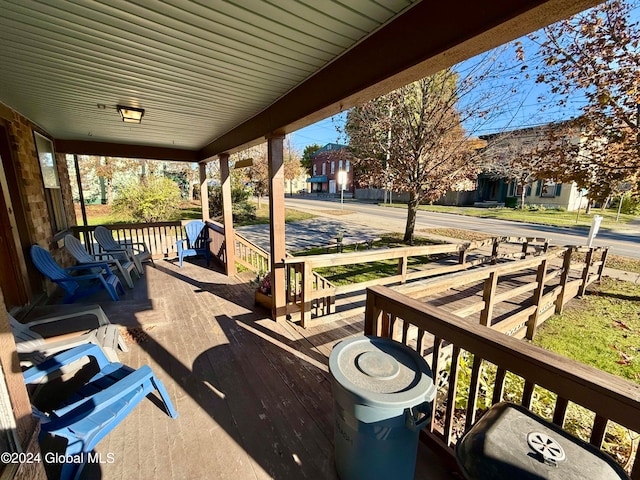 view of patio featuring a porch