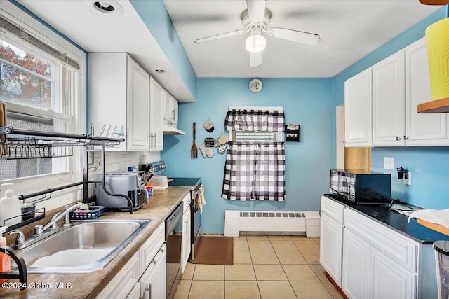 kitchen with black appliances, sink, backsplash, white cabinetry, and light tile patterned floors