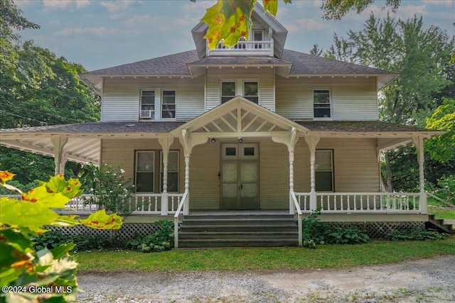 view of front of home featuring covered porch