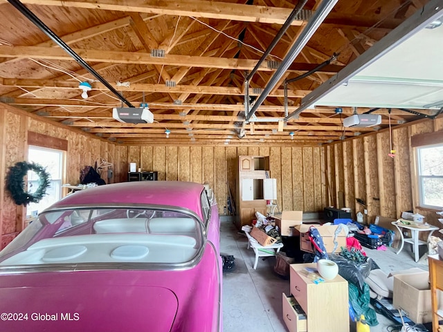 garage featuring a garage door opener