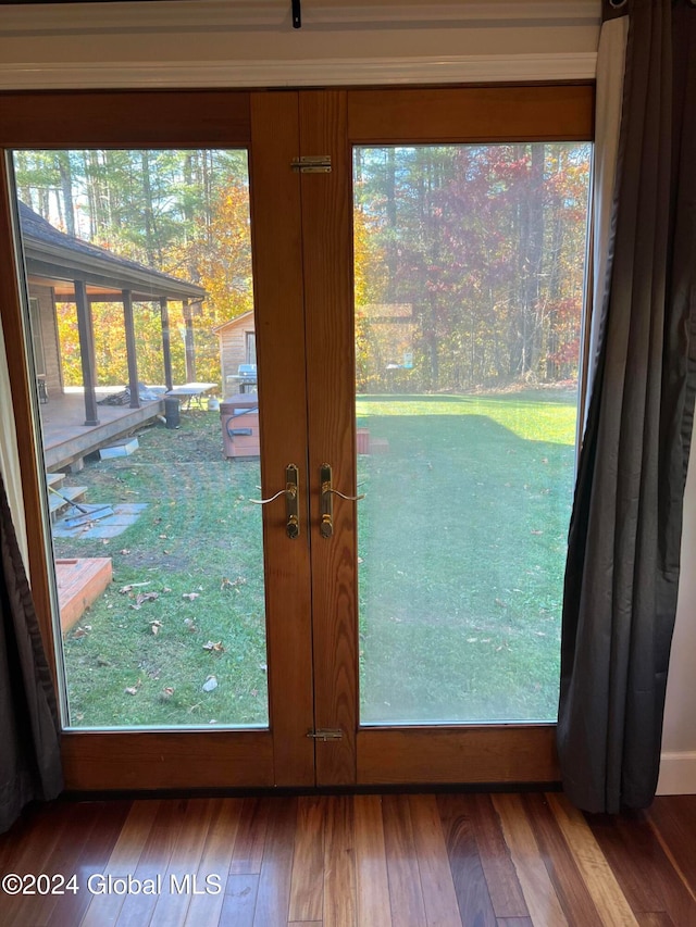 doorway featuring french doors and wood-type flooring