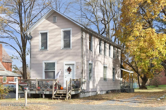 view of front of house with a deck