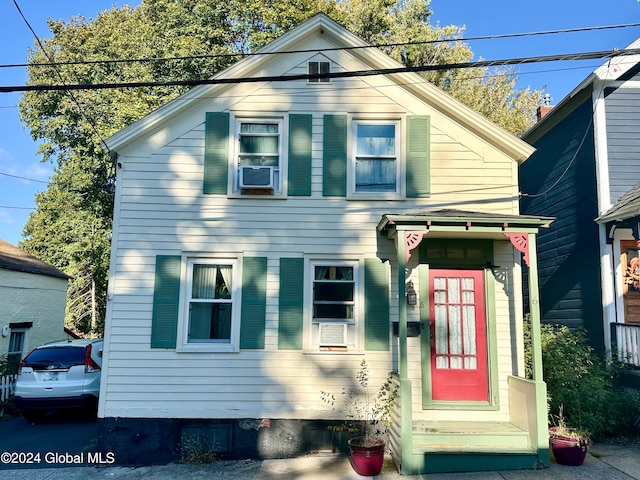 view of front of property featuring cooling unit