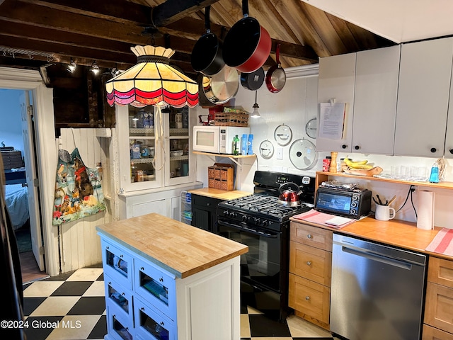 kitchen featuring stainless steel dishwasher, butcher block counters, white cabinetry, and black gas range oven