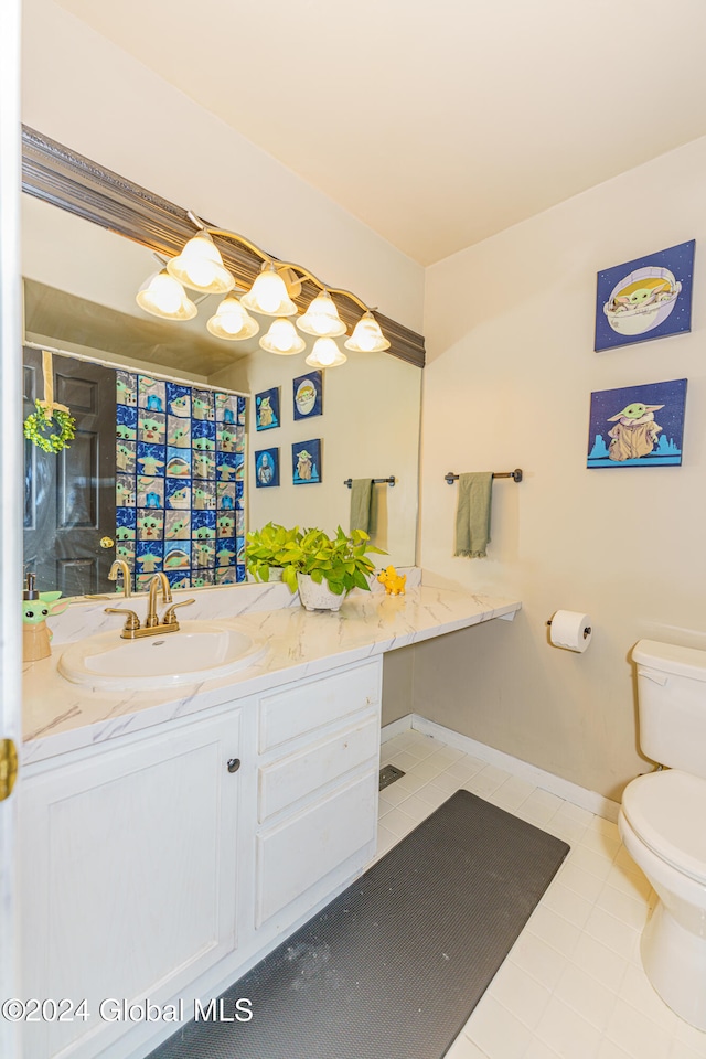 bathroom featuring vanity, a shower with curtain, toilet, and tile patterned flooring