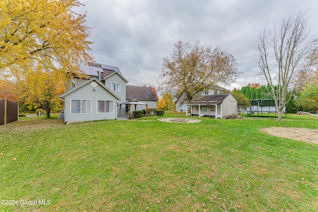 view of yard with a storage shed