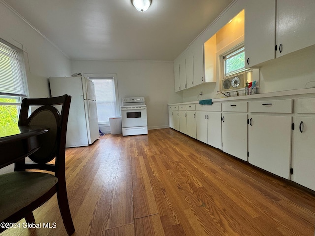 kitchen with ornamental molding, white cabinets, white appliances, and light hardwood / wood-style floors