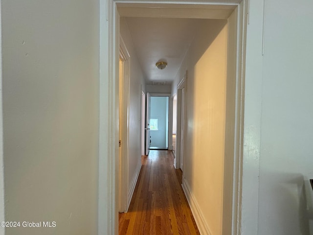 hall featuring wood-type flooring