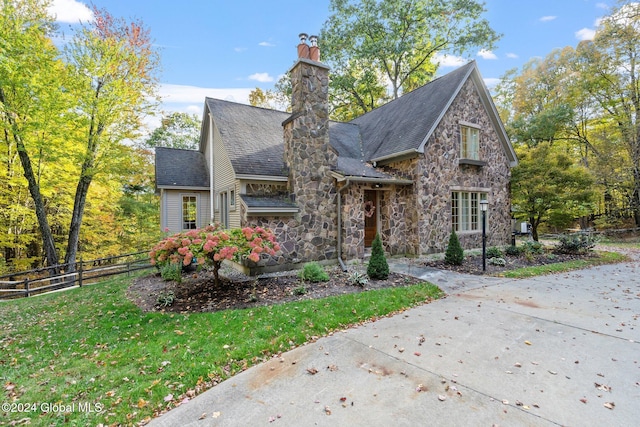 view of front of home with a front yard