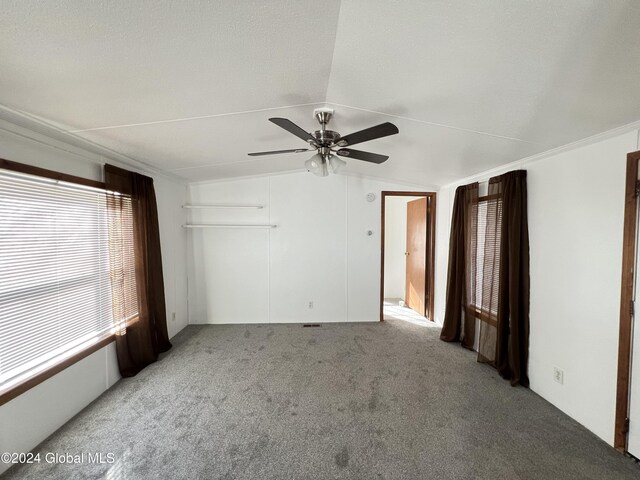 66 Plains Rd, Jackson, NY 12816 - unfurnished room with a ceiling fan, lofted ceiling, and light colored carpet