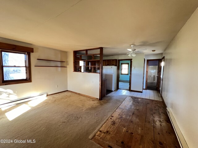 66 Plains Rd, Jackson, NY 12816 - interior space with baseboards, a baseboard radiator, ceiling fan, and a baseboard heating unit