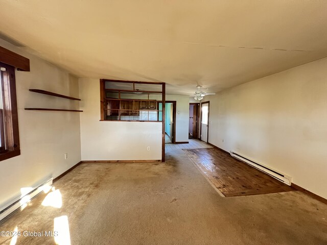 66 Plains Rd, Jackson, NY 12816 - empty room featuring carpet floors, a baseboard radiator, baseboards, and a ceiling fan