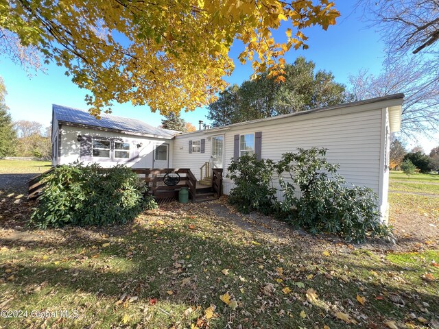 66 Plains Rd, Jackson, NY 12816 - back of property featuring a wooden deck