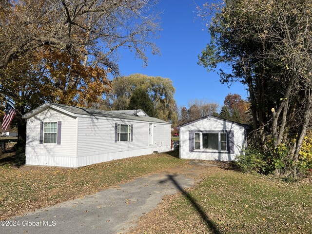 66 Plains Rd, Jackson, NY 12816 - view of front of home with a front lawn
