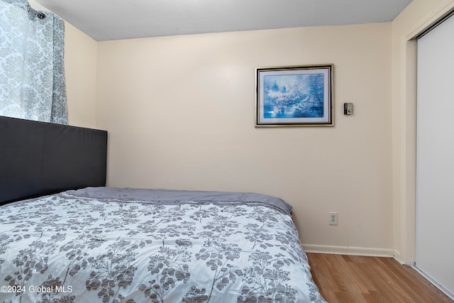 bedroom featuring light hardwood / wood-style flooring