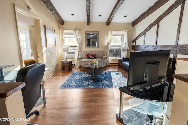 living room featuring beamed ceiling and light hardwood / wood-style flooring