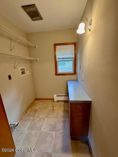 laundry room featuring baseboard heating, hookup for an electric dryer, and hookup for a washing machine