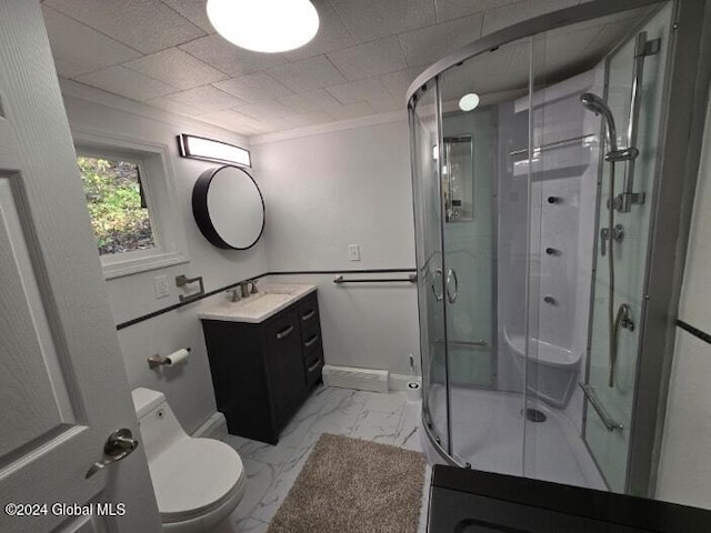 bathroom with walk in shower, toilet, vanity, and crown molding