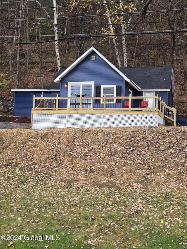 view of front of house featuring a deck