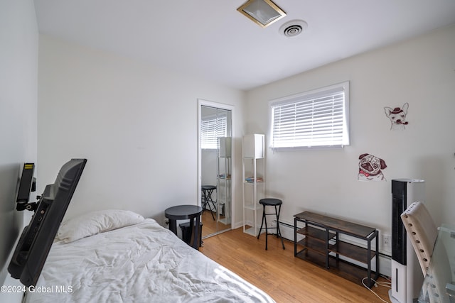 bedroom with light wood-type flooring