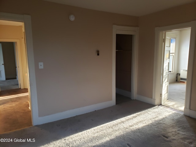 unfurnished bedroom featuring carpet floors