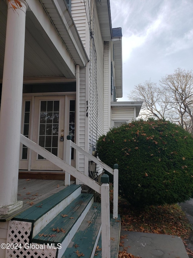 view of side of property with french doors