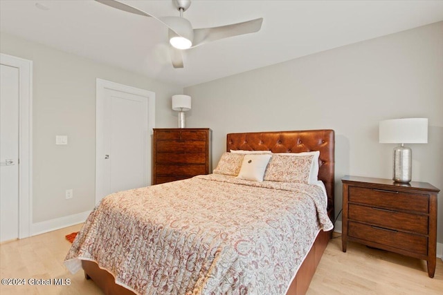 bedroom featuring ceiling fan and light hardwood / wood-style floors