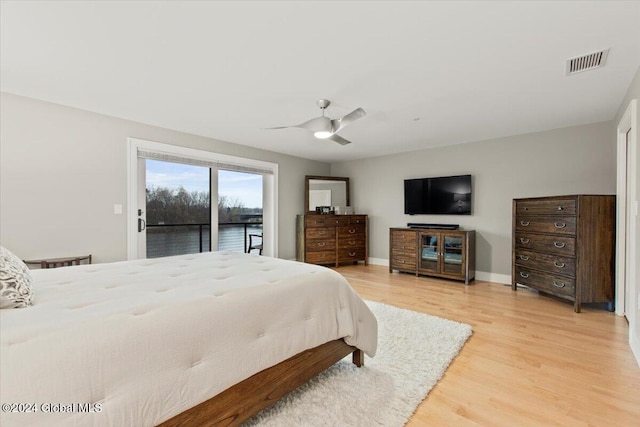 bedroom with ceiling fan, access to exterior, and light wood-type flooring