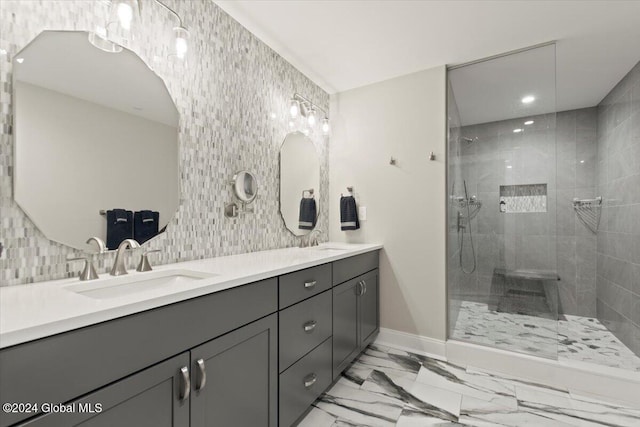 bathroom featuring vanity and a tile shower