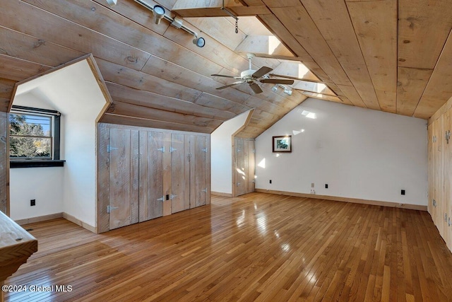 bonus room featuring lofted ceiling, wooden ceiling, light wood-type flooring, and ceiling fan