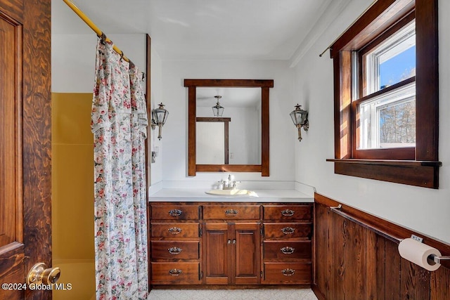 bathroom featuring vanity and shower / bath combo