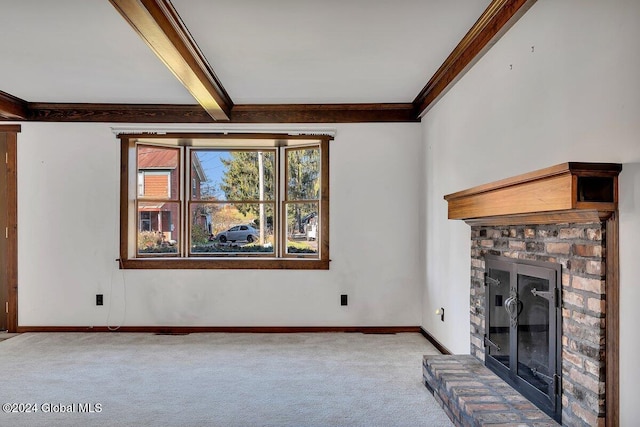 unfurnished living room with light carpet, crown molding, beam ceiling, and a brick fireplace