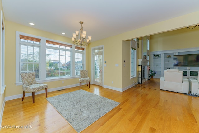5 Teasdale Ct, Colonie, NY 12189 - living area featuring a notable chandelier, light wood-style flooring, recessed lighting, baseboards, and visible vents