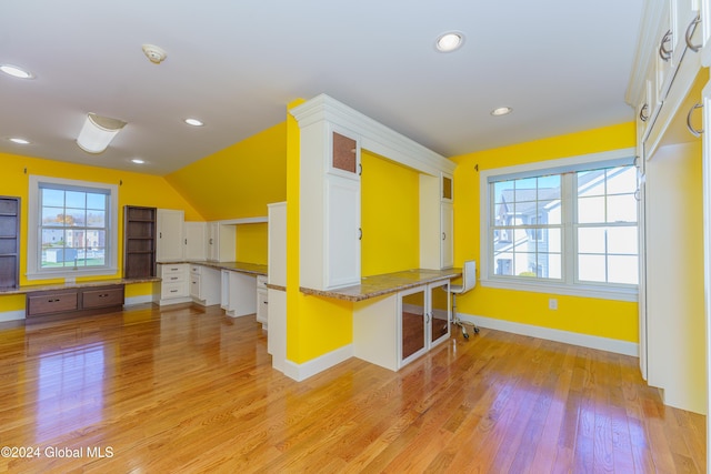 5 Teasdale Ct, Colonie, NY 12189 - interior space featuring glass insert cabinets, baseboards, recessed lighting, white cabinets, and light wood finished floors