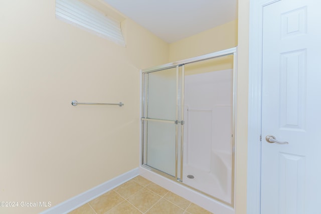 5 Teasdale Ct, Colonie, NY 12189 - full bath featuring an enclosed shower, baseboards, and tile patterned floors