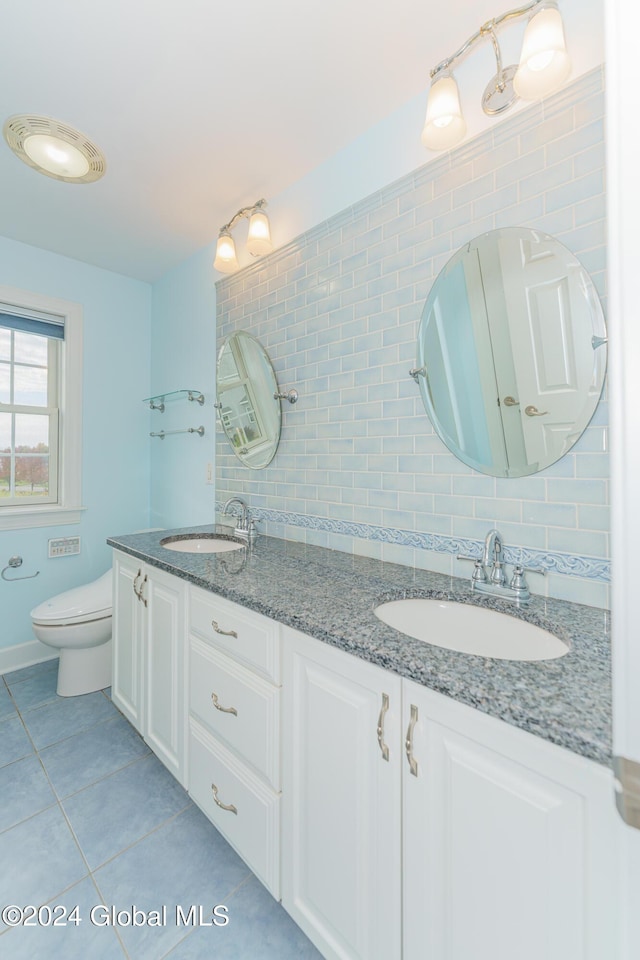 5 Teasdale Ct, Colonie, NY 12189 - bathroom featuring double vanity, toilet, tile patterned floors, and a sink