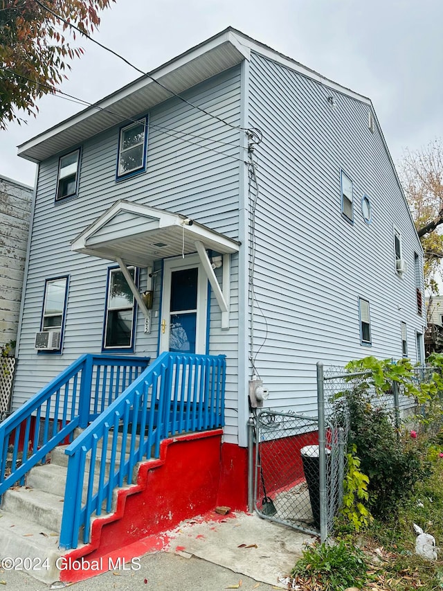 view of front of home with cooling unit