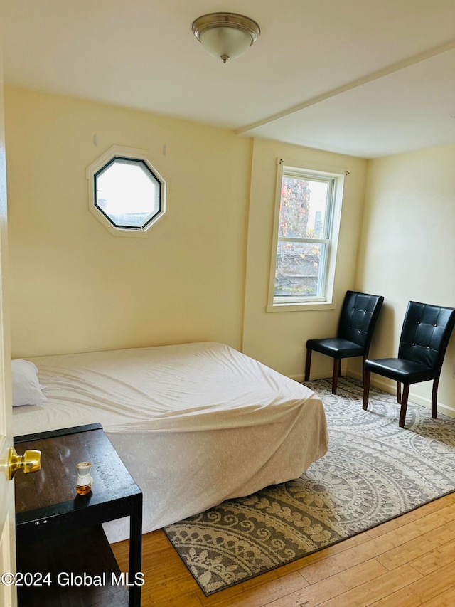 bedroom featuring hardwood / wood-style flooring