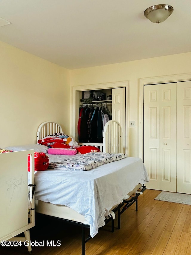 bedroom featuring hardwood / wood-style flooring