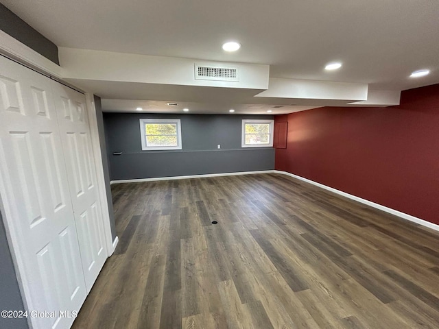 basement with dark wood-type flooring