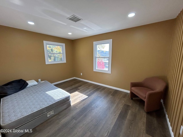 bedroom featuring dark wood-type flooring