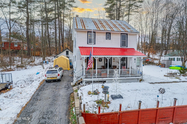 view of front of home featuring covered porch