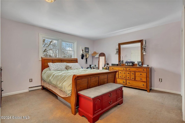 bedroom with light colored carpet and a baseboard heating unit