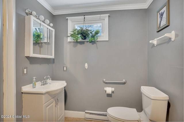 bathroom with vanity, toilet, ornamental molding, and a baseboard heating unit