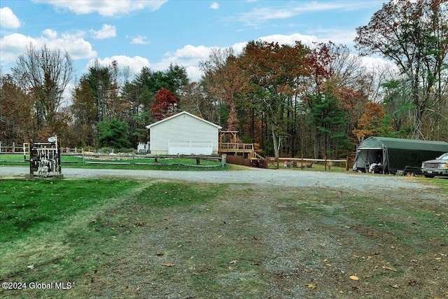 view of yard featuring a carport