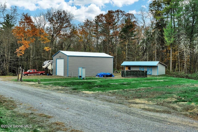 view of outbuilding with a garage