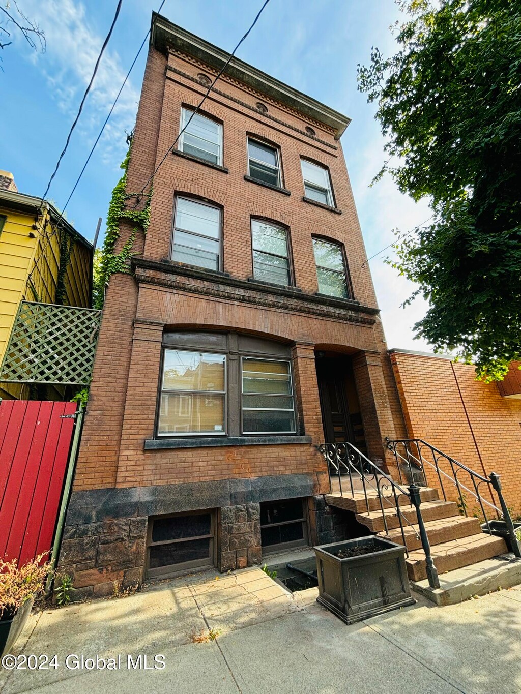 view of building exterior featuring central AC