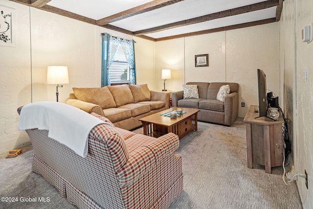 living room with carpet flooring and beamed ceiling