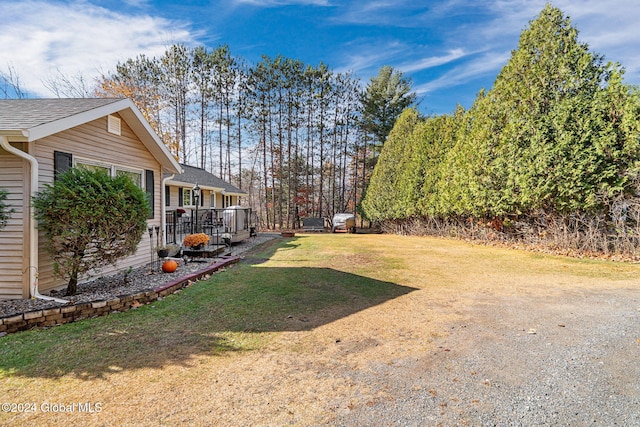 view of yard featuring a deck